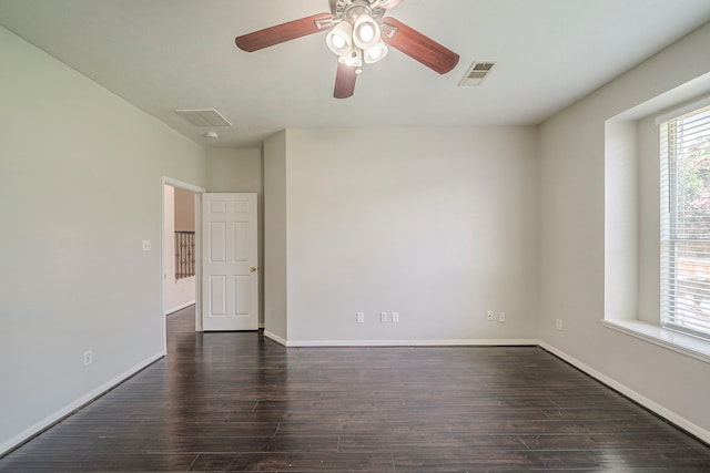 13430 Magnolia Crest Ln, Houston, TX 77070 - empty room featuring dark wood-style flooring and ceiling fan