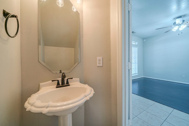13430 Magnolia Crest Ln, Houston, TX 77070 - bathroom featuring ceiling fan and tile patterned flooring