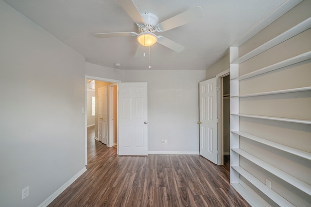 13430 Magnolia Crest Ln, Houston, TX 77070 - unfurnished bedroom featuring dark wood-style floors and ceiling fan