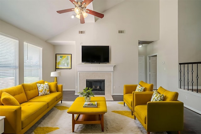 13430 Magnolia Crest Ln, Houston, TX 77070 - living area featuring high vaulted ceiling, ceiling fan, and a tiled fireplace