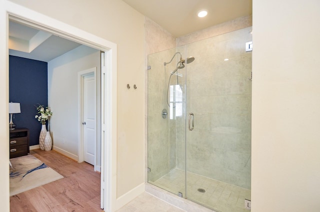4915 Ave J, Houston, TX 77011 - bathroom with a stall shower, wood finished floors, and recessed lighting