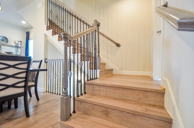 4915 Ave J, Houston, TX 77011 - stairway featuring wood finished floors and recessed lighting