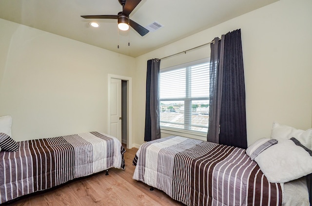 4915 Ave J, Houston, TX 77011 - bedroom with wood finished floors, a ceiling fan, and recessed lighting