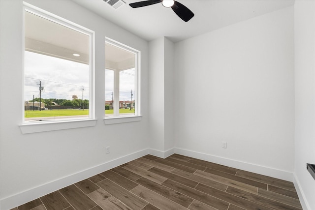 131 S Virginia Ave, La Porte, TX 77571 - spare room featuring dark wood finished floors and ceiling fan
