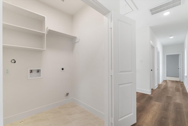 131 S Virginia Ave, La Porte, TX 77571 - laundry room with hookup for an electric dryer, washer hookup, attic access, and gas dryer hookup
