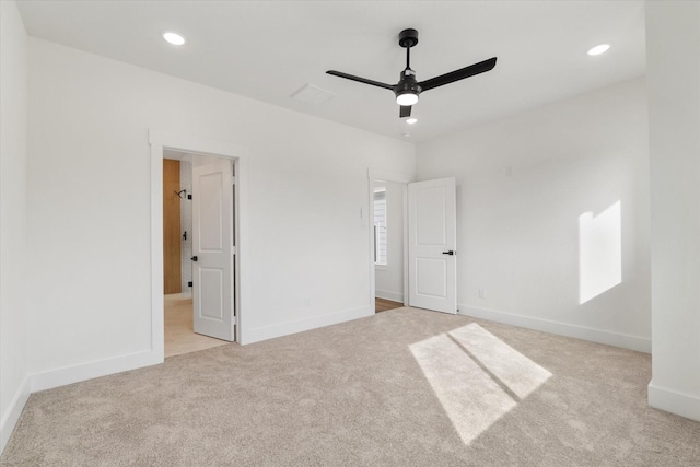 131 S Virginia Ave, La Porte, TX 77571 - unfurnished bedroom featuring light colored carpet, recessed lighting, and a ceiling fan