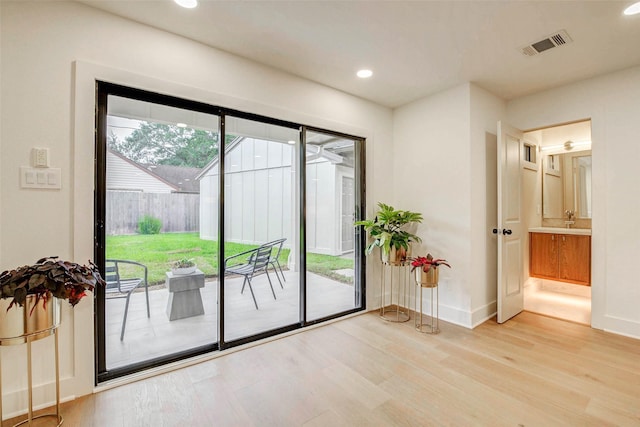 2831 Shadowdale Dr, Houston, TX 77043 - entryway featuring wood finished floors and recessed lighting