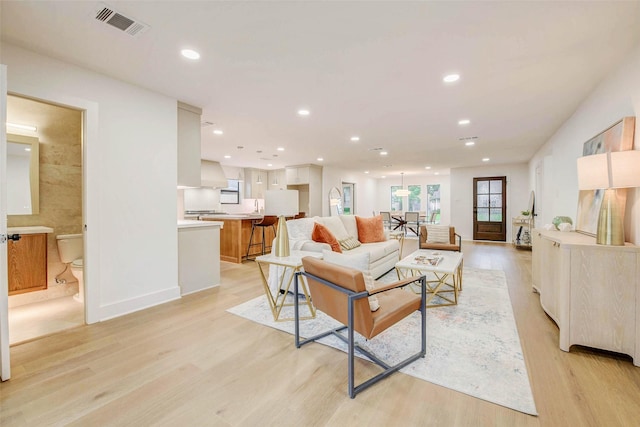 2831 Shadowdale Dr, Houston, TX 77043 - living room featuring light wood-style floors and recessed lighting