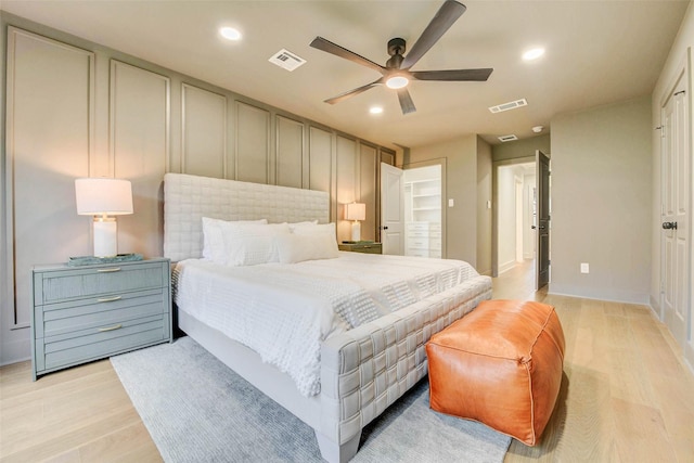 2831 Shadowdale Dr, Houston, TX 77043 - bedroom featuring recessed lighting, light wood-type flooring, and a ceiling fan
