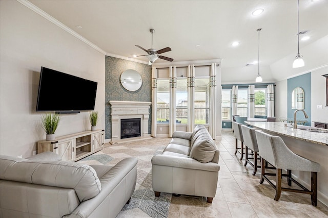 19427 Stanton Lake Dr, Cypress, TX 77433 - living area featuring ornamental molding, a ceiling fan, a large fireplace, light tile patterned floors, and recessed lighting