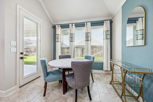 19427 Stanton Lake Dr, Cypress, TX 77433 - dining space with ornamental molding, vaulted ceiling, and light tile patterned flooring