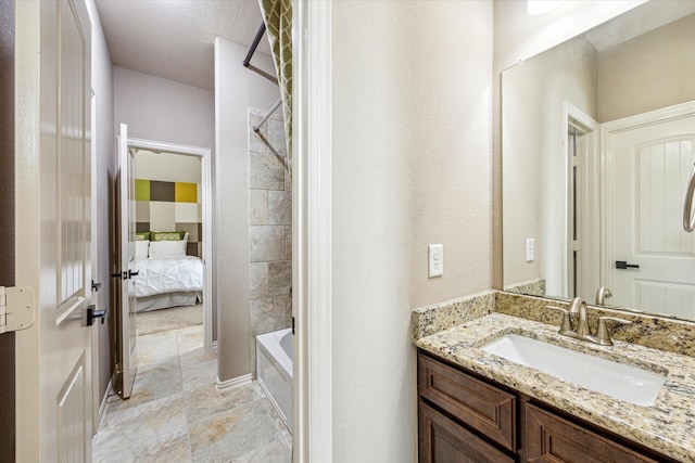 19427 Stanton Lake Dr, Cypress, TX 77433 - ensuite bathroom featuring vanity and shower / bathtub combination