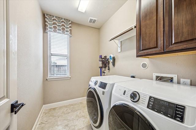 19427 Stanton Lake Dr, Cypress, TX 77433 - washroom with cabinet space and washing machine and dryer