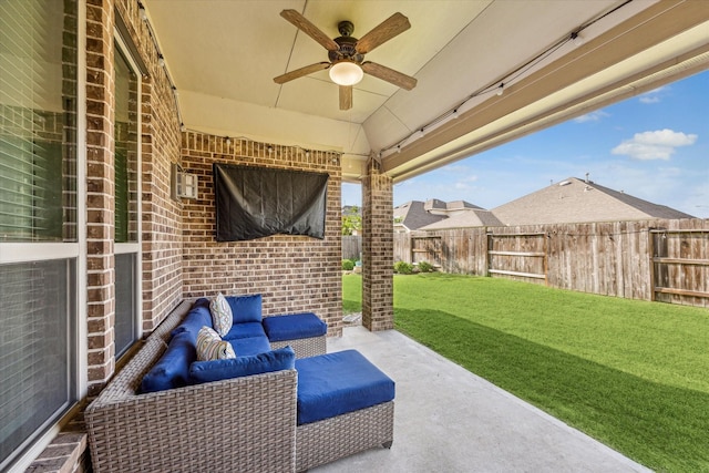 19427 Stanton Lake Dr, Cypress, TX 77433 - fenced backyard with ceiling fan, a patio area, and outdoor lounge area