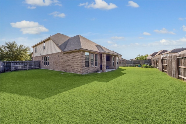 19427 Stanton Lake Dr, Cypress, TX 77433 - rear view of house featuring brick siding and a fenced backyard