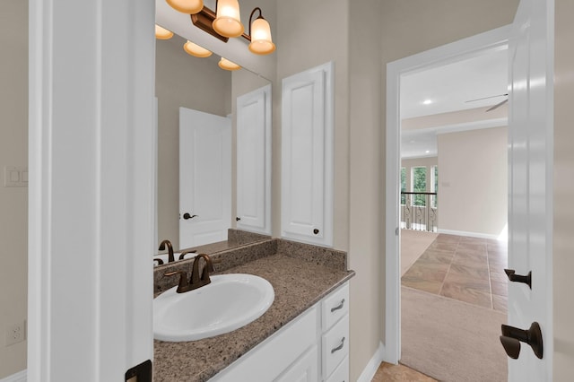 3403 Wooded Ln, Conroe, TX 77301 - bathroom with vanity and baseboards