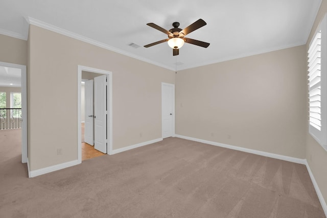 3403 Wooded Ln, Conroe, TX 77301 - unfurnished bedroom with light colored carpet, crown molding, and ensuite bath