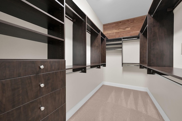 3403 Wooded Ln, Conroe, TX 77301 - walk in closet featuring light colored carpet