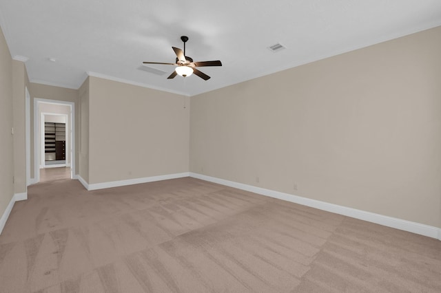 3403 Wooded Ln, Conroe, TX 77301 - empty room with light colored carpet, a ceiling fan, and ornamental molding