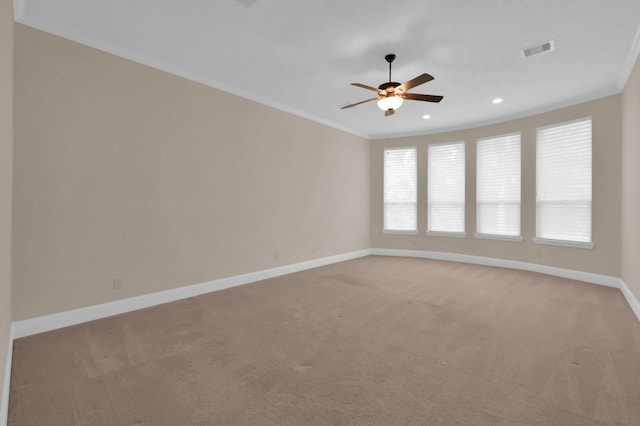 3403 Wooded Ln, Conroe, TX 77301 - spare room with light carpet, ceiling fan, recessed lighting, and ornamental molding