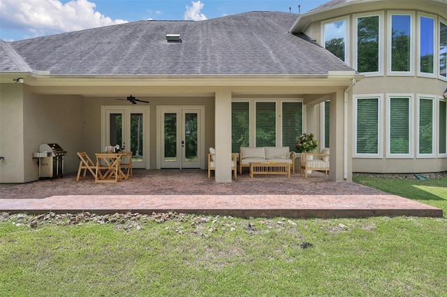 3403 Wooded Ln, Conroe, TX 77301 - back of house with french doors, roof with shingles, a lawn, outdoor lounge area, and stucco siding