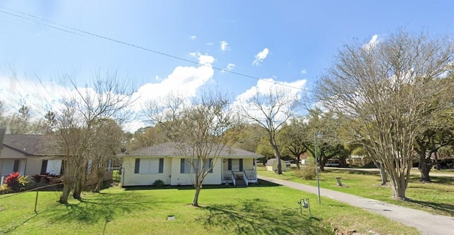 2104 Westward Ln, Marque, TX 77568 - ranch-style home with a front yard