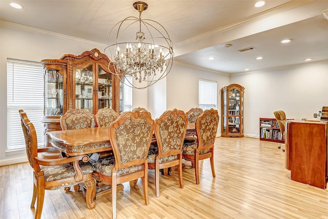3022 Triway Ln, Houston, TX 77043 - dining area with light wood finished floors, a chandelier, ornamental molding, and recessed lighting