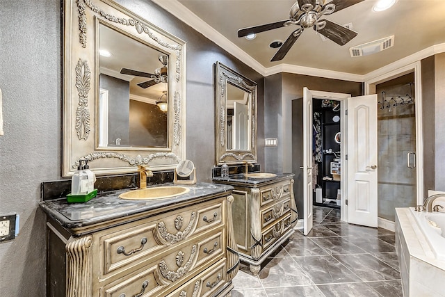 3022 Triway Ln, Houston, TX 77043 - bathroom featuring a ceiling fan, a textured wall, two vanities, crown molding, and tiled bath