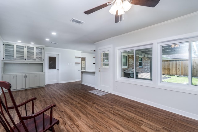 2007 Lamonte Ln, Houston, TX 77018 - unfurnished room featuring crown molding, ceiling fan, dark wood-style floors, and recessed lighting