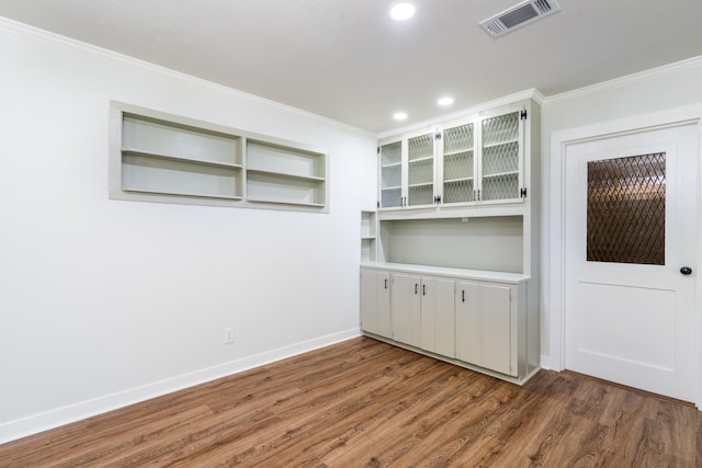 2007 Lamonte Ln, Houston, TX 77018 - spare room with ornamental molding, wood finished floors, and recessed lighting