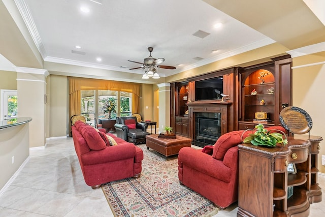 7826 Camden Hollow Ln, Humble, TX 77396 - living area with ornamental molding, a glass covered fireplace, recessed lighting, a ceiling fan, and light tile patterned floors
