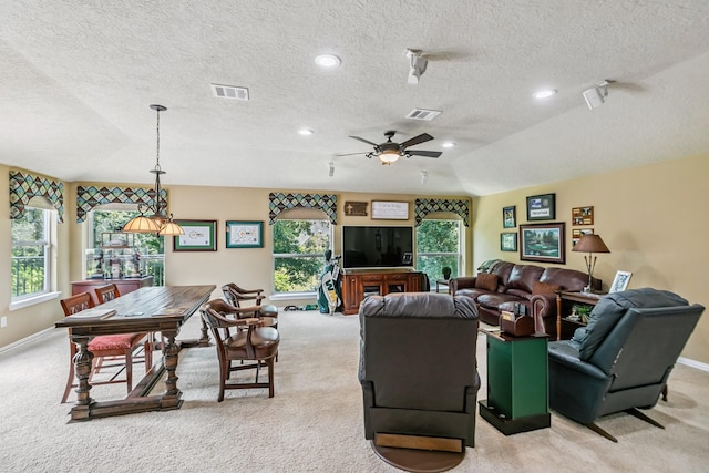 7826 Camden Hollow Ln, Humble, TX 77396 - living area featuring light colored carpet, a textured ceiling, ceiling fan, and recessed lighting