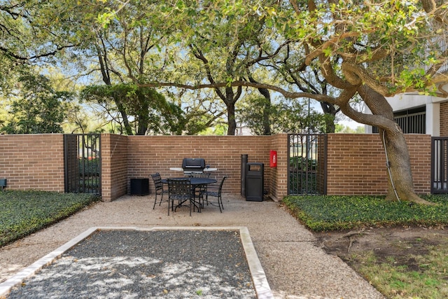 3600 Montrose Blvd Unit 209, Houston, TX 77006 - view of patio featuring a gate