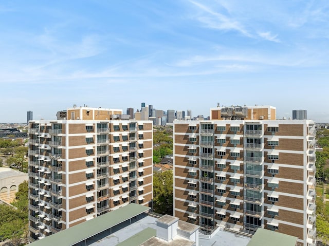 3600 Montrose Blvd Unit 209, Houston, TX 77006 - view of apartment building / complex with a view of city