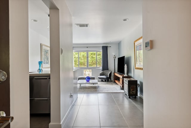 3600 Montrose Blvd Unit 209, Houston, TX 77006 - tiled living area with a wood stove