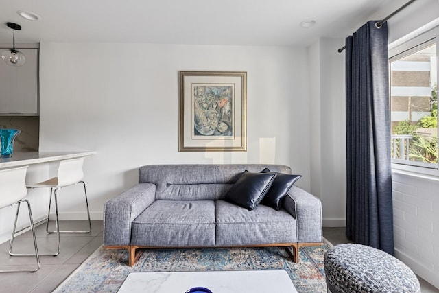 3600 Montrose Blvd Unit 209, Houston, TX 77006 - living area featuring plenty of natural light, tile patterned flooring, and recessed lighting