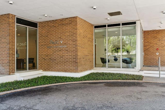 3600 Montrose Blvd Unit 209, Houston, TX 77006 - property entrance featuring brick siding and a surveillance system
