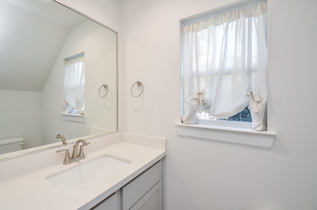 9577 Neuens Rd Unit F, Houston, TX 77080 - half bath featuring vanity and vaulted ceiling