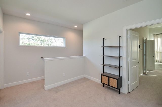 9577 Neuens Rd Unit F, Houston, TX 77080 - unfurnished room with light colored carpet and recessed lighting