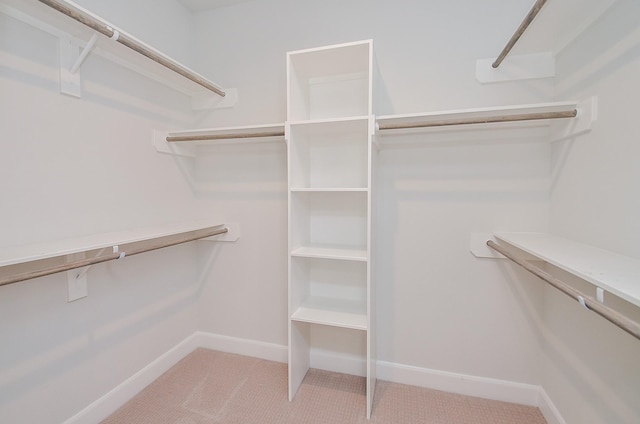 9577 Neuens Rd Unit F, Houston, TX 77080 - spacious closet featuring light carpet