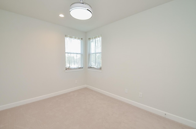 9577 Neuens Rd Unit F, Houston, TX 77080 - spare room featuring light colored carpet and recessed lighting
