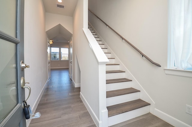 9577 Neuens Rd Unit F, Houston, TX 77080 - stairs featuring wood finished floors and baseboards