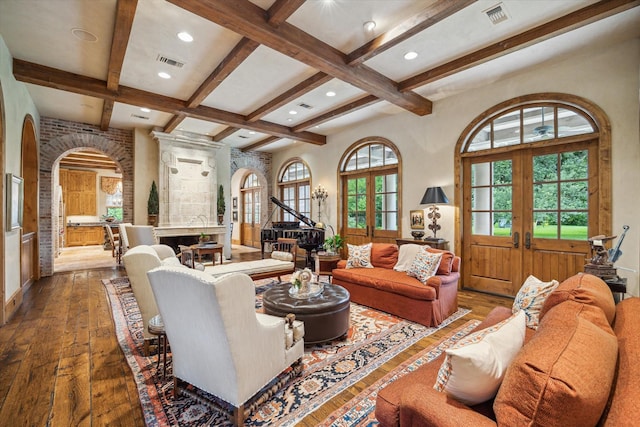 3 E Rivercrest Dr, Houston, TX 77042 - living room featuring french doors, hardwood / wood-style flooring, coffered ceiling, beamed ceiling, and arched walkways