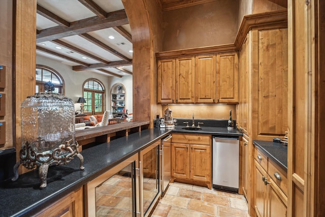 3 E Rivercrest Dr, Houston, TX 77042 - kitchen with beverage cooler, beam ceiling, stone tile flooring, brown cabinets, and recessed lighting