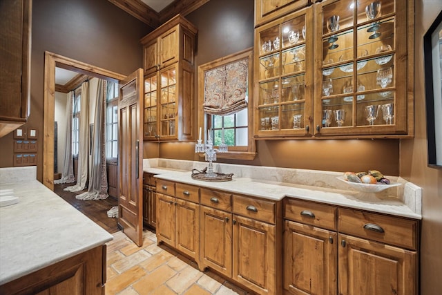 3 E Rivercrest Dr, Houston, TX 77042 - kitchen featuring brown cabinets and glass insert cabinets