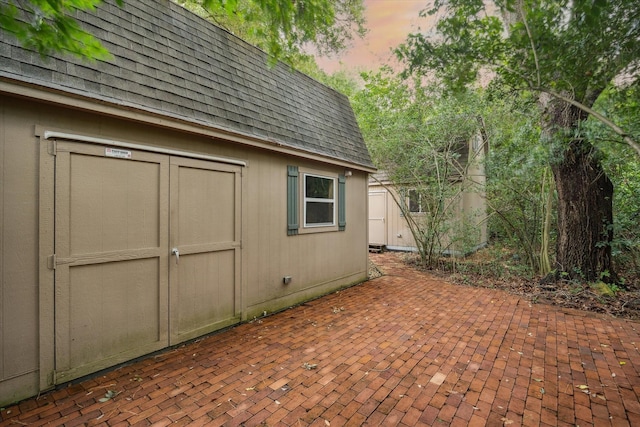 3 E Rivercrest Dr, Houston, TX 77042 - outdoor structure at dusk with a shed