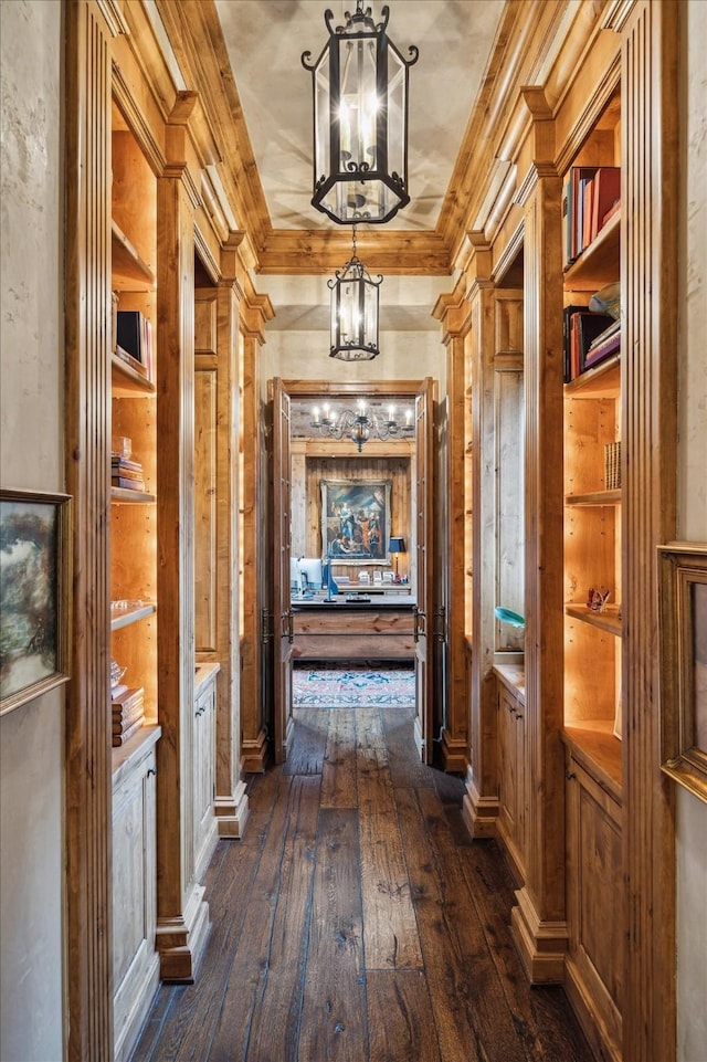 3 E Rivercrest Dr, Houston, TX 77042 - hallway with a chandelier, dark wood-style flooring, crown molding, and a raised ceiling
