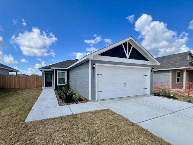 396 Tejas Trl, Waller, TX 77484 - single story home featuring a garage, driveway, and roof with shingles