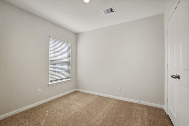 396 Tejas Trl, Waller, TX 77484 - carpeted spare room featuring baseboards