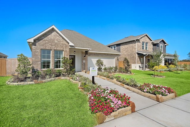 10722 Sky Creek Ln, Beasley, TX 77417 - traditional-style home with brick siding, an attached garage, and concrete driveway